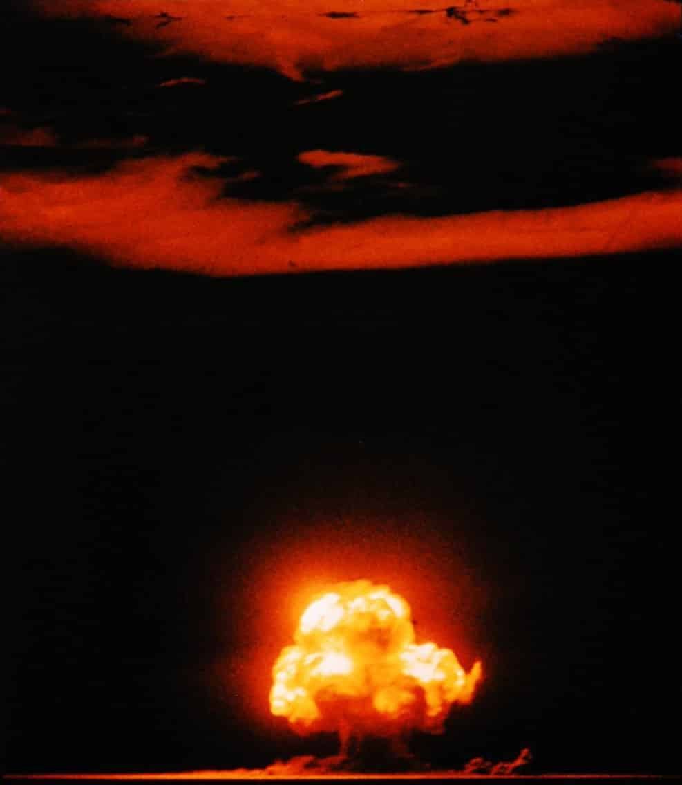 A colour photograph of the Trinity shot - the first nuclear test explosion