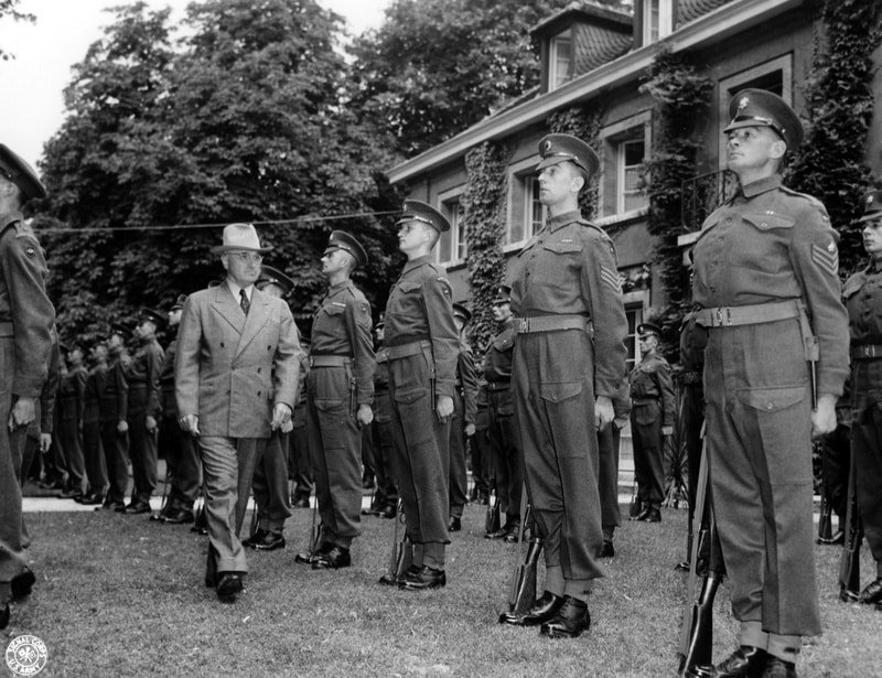 President Harry S. Truman inspecting the guards at Winston Churchill's residence