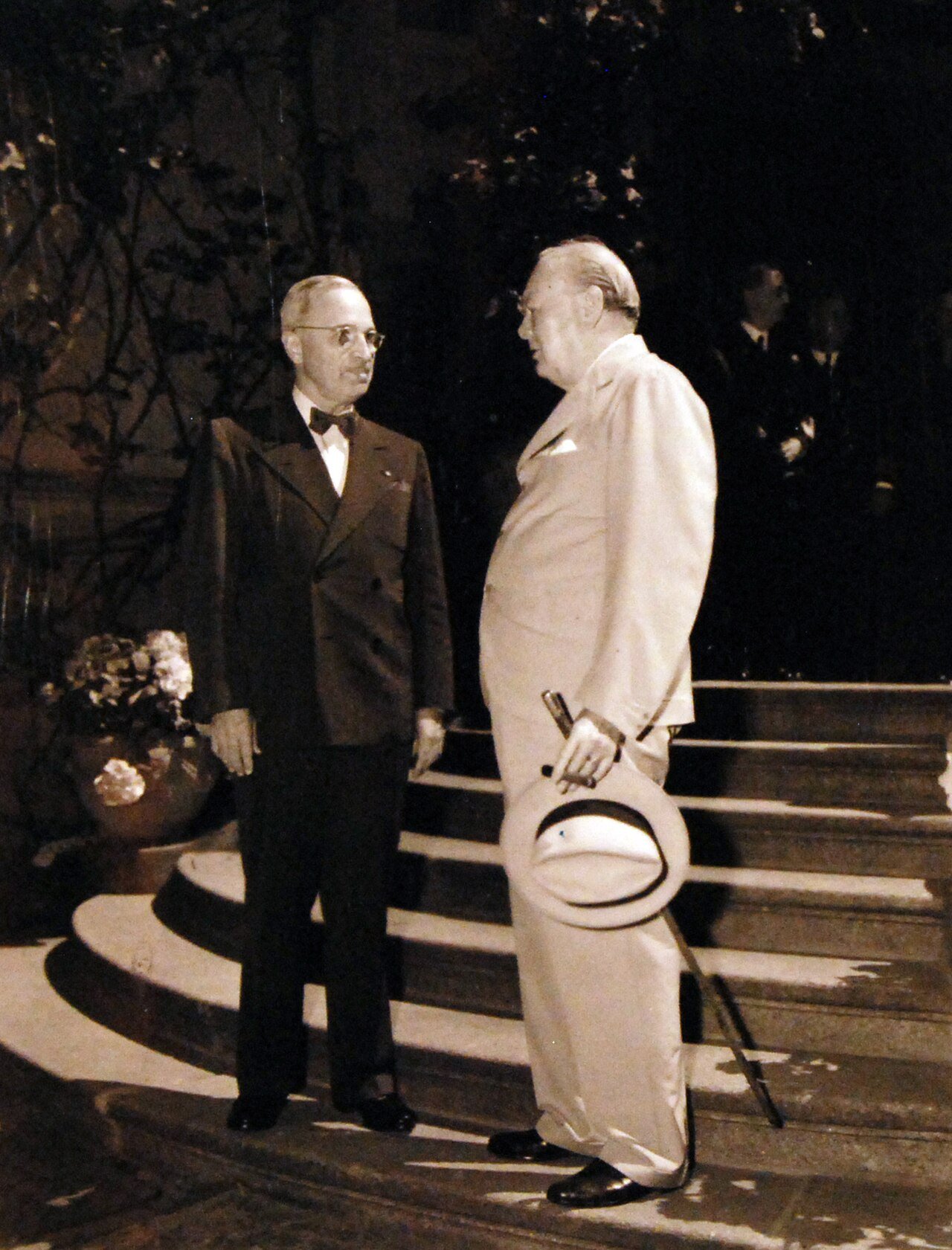 80-G-49982: Potsdam Conference, 17 July – 2 August 1945. Prime Minister Winston S. Churchill pays a visit to President Harry S. Truman at the “Little White House in Potsdam, Germany. Photographed by CPhoM Wm. Belknap, received July 16, 1945. U.S. Navy Photograph, now in the collections of the National Archives. (2016/02/23).