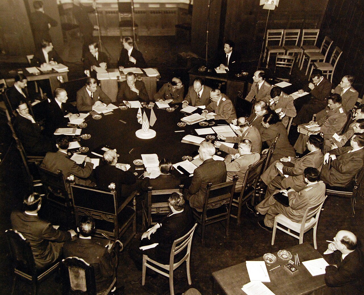 80-G-700116: Potsdam Conference, 17 July – 2 August 1945. The “Little Three” (Foreign Ministers) meeting in the same conference room as the Heads of States at Potsdam, Germany. Foreign Minister Anthony Eden at upper left, Secretary of State James F. Byrnes, and lower left, Foreign Commissar V. Molotov, extreme right. Photographed released July 24, 1945. U.S. Navy Photograph, now in the collections of the National Archives. (2016/02/23).