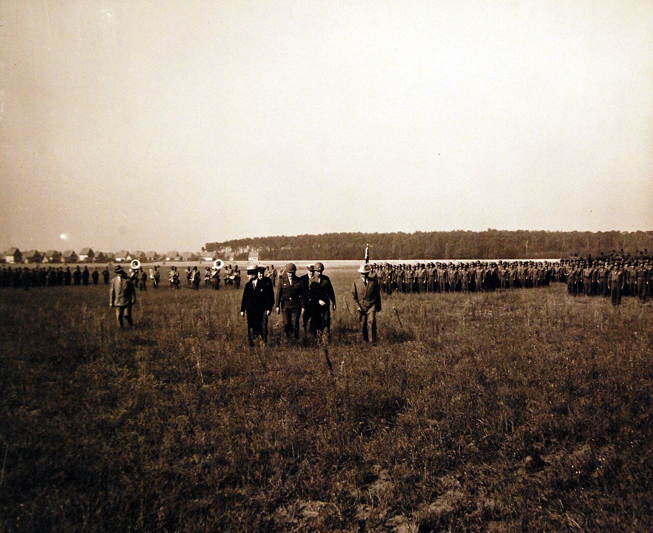 80-G-700160: Potsdam Conference, 17 July – 2 August 1945. President Harry S. Truman and party inspecting troops off 3rd Armored Division just south of Frankfurt, Germany. Photographed by CPhoM William Belknap Jr., released July 26, 1945. U.S. Navy Photograph, now in the collections of the National Archives. (2016/02/23).