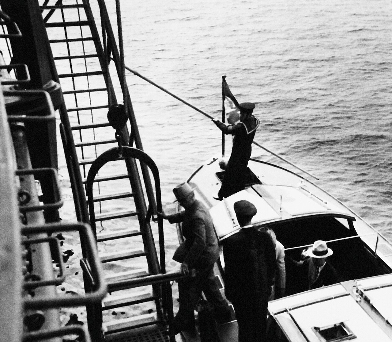 80-G-700248: Potsdam Conference, 17 July – 2 August 1945. President Harry S. Truman’s barge comes alongside HMS Renown at Plymouth, England. Photograph released August 1945. U.S. Navy Photograph, now in the collections of the National Archives. (2016/02/23).