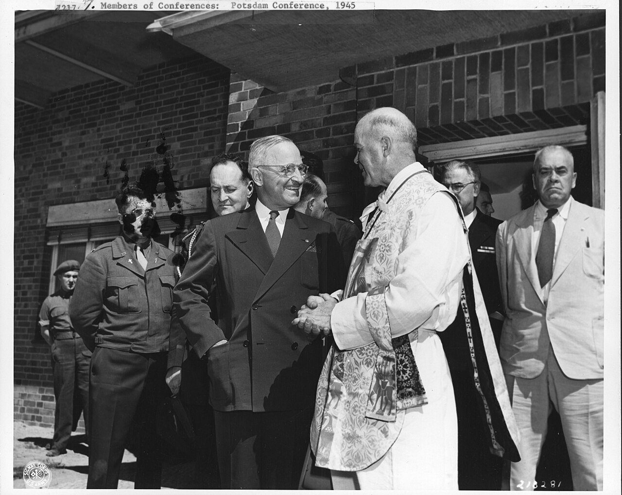 Scope and content: President Harry S. Truman talks to Colonel L. Curtis Tuernan of Kansas City, Mo., Chaplin, US Forces European Theater of Operations, after church services in the conference area, Germany. Berlin. 07/22/45.
