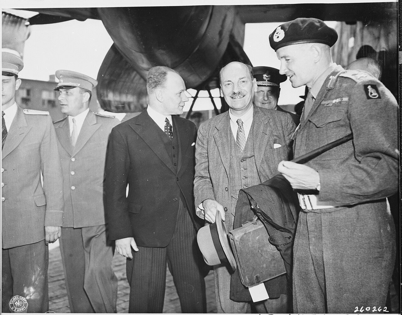 British candidate for Prime Minister Clement Attlee (fourth from left) arrives at Gatow Airport in Berlin, Germany to…