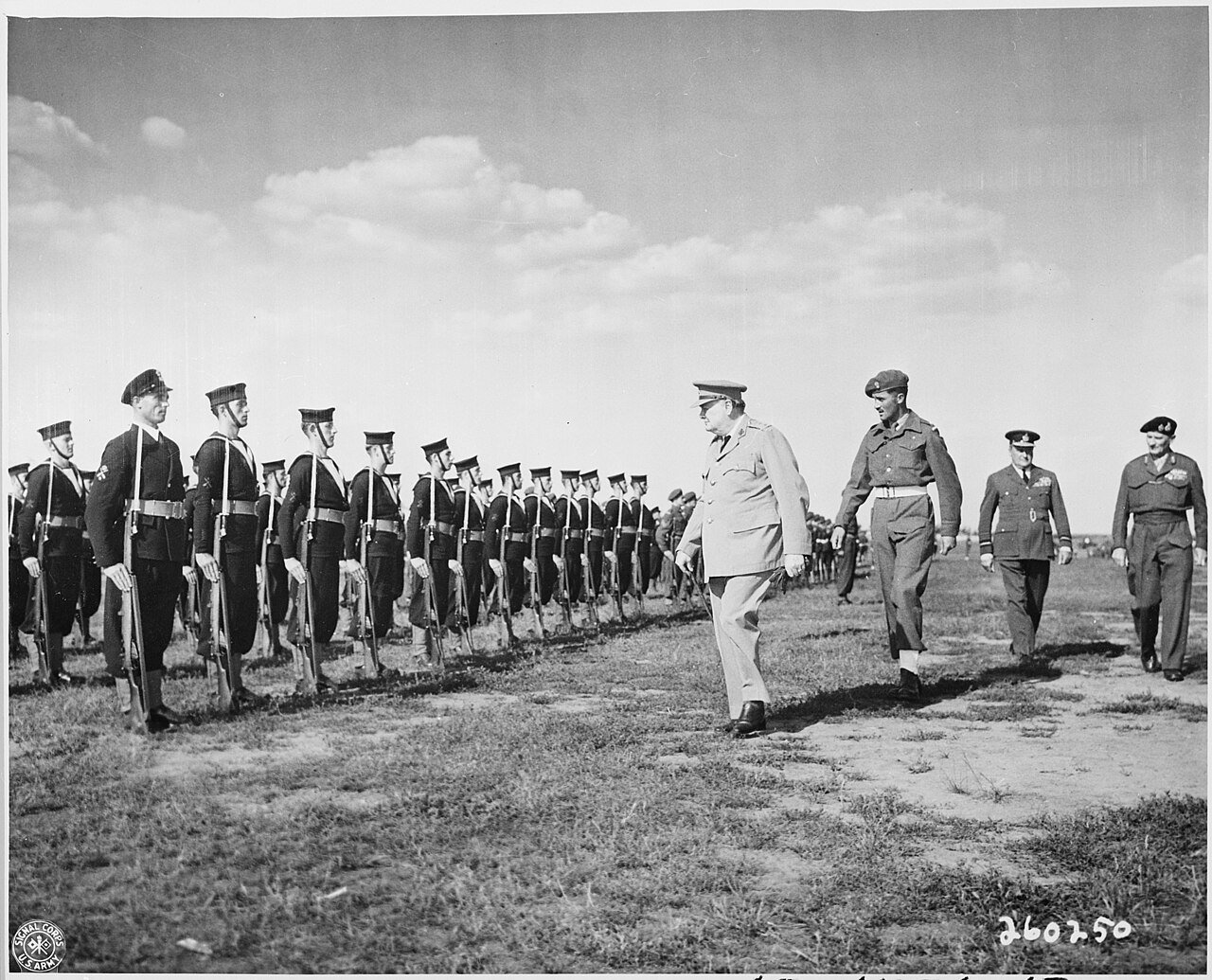 British Prime Minister Winston Churchill reviews honor guard at Gatow Airport in Berlin, Germany where he has just…