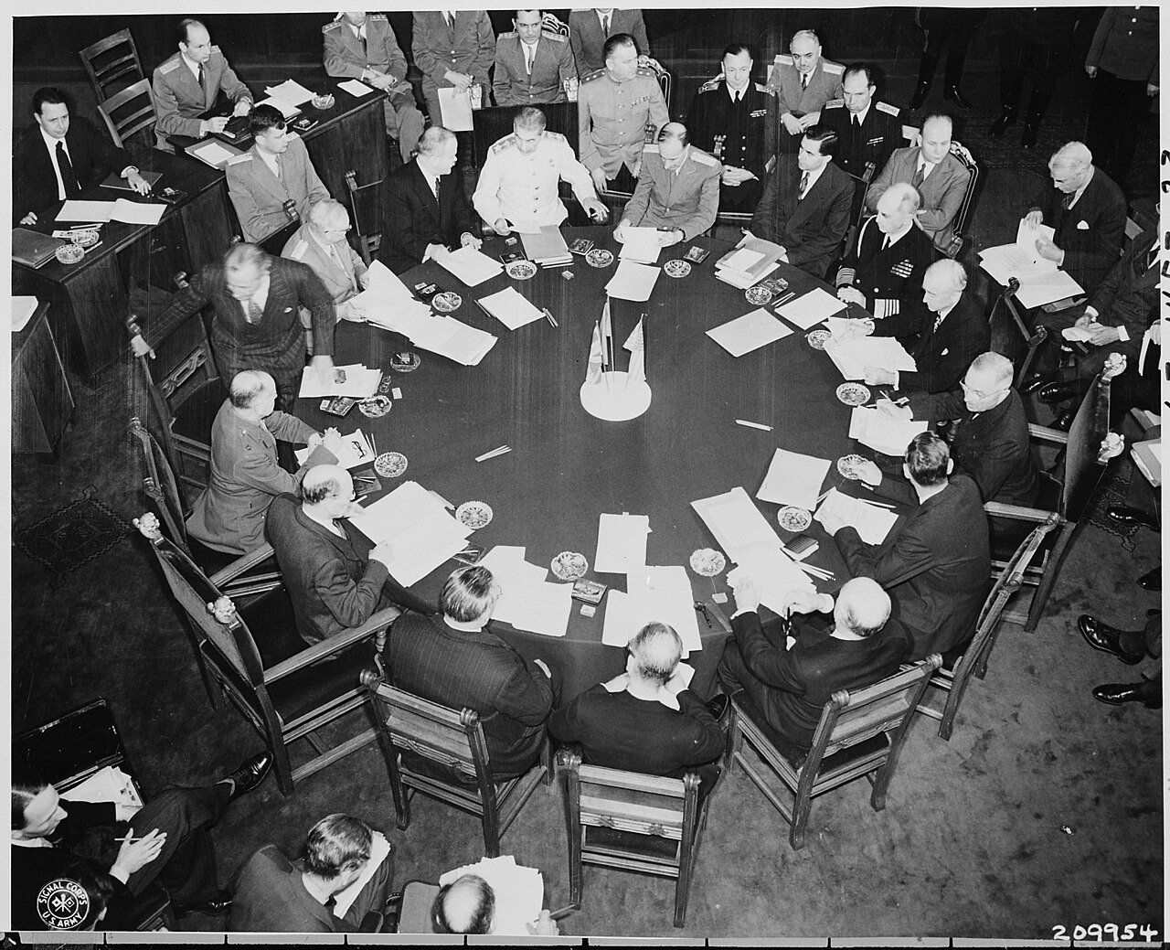 Closer view of round conference table from above, taken at the Potsdam Conference during newly elected British Prime…