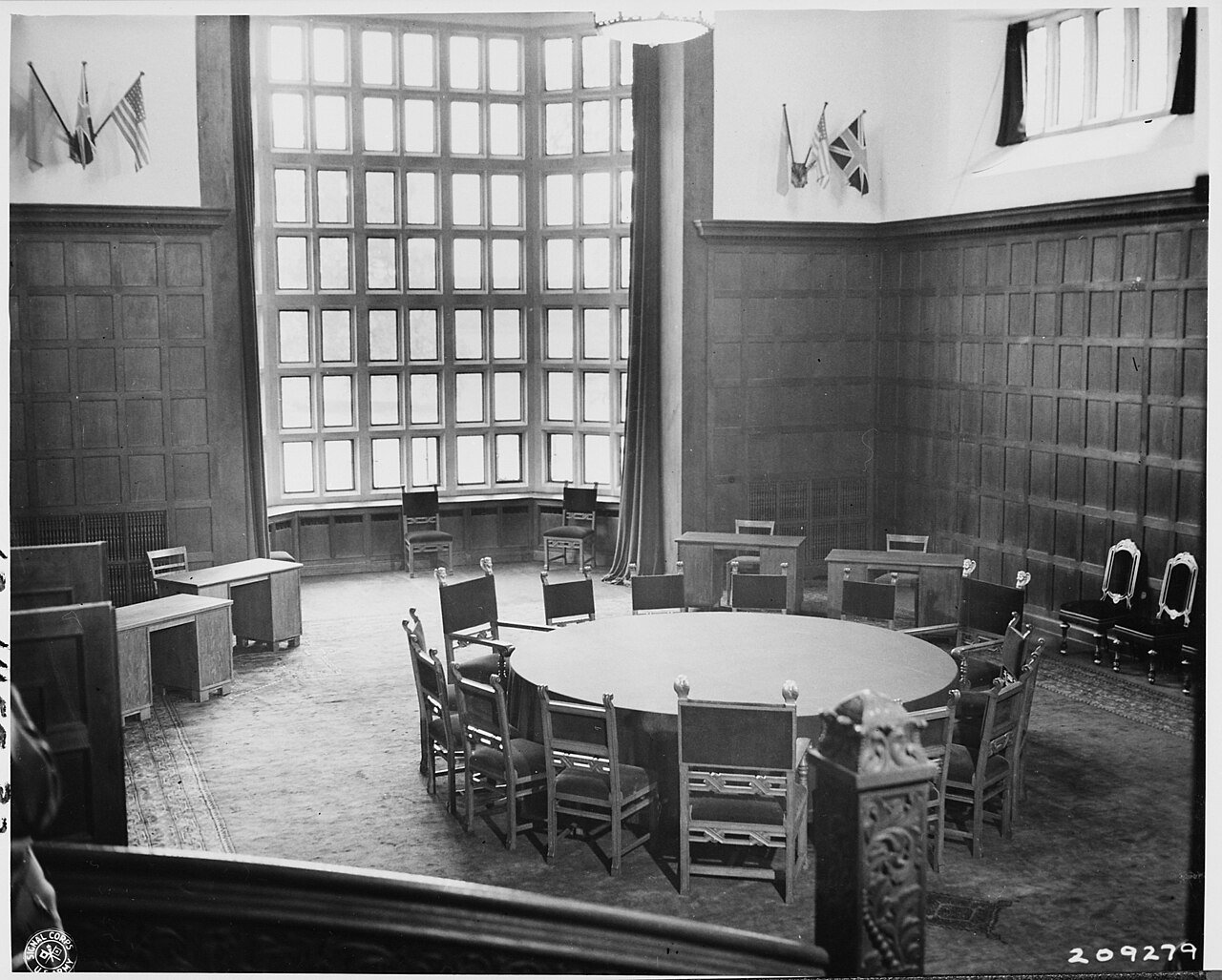 Conference room at Cecilienhof Palace, site of the Potsdam Conference in Potsdam, Germany. The walls are decorated…