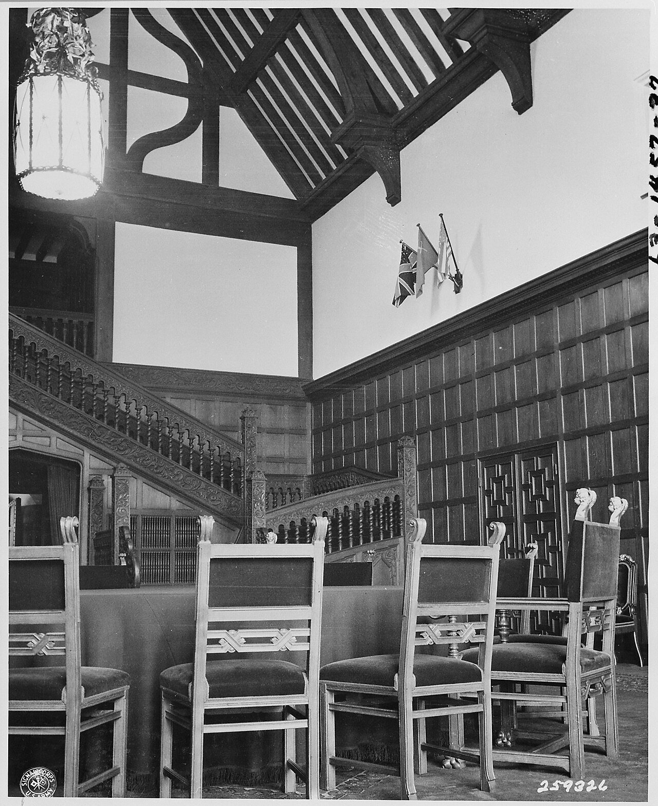 Conference room of Cecilienhof Palace, site of the Potsdam Conference in Potsdam, Germany. The Chairs in foreground…