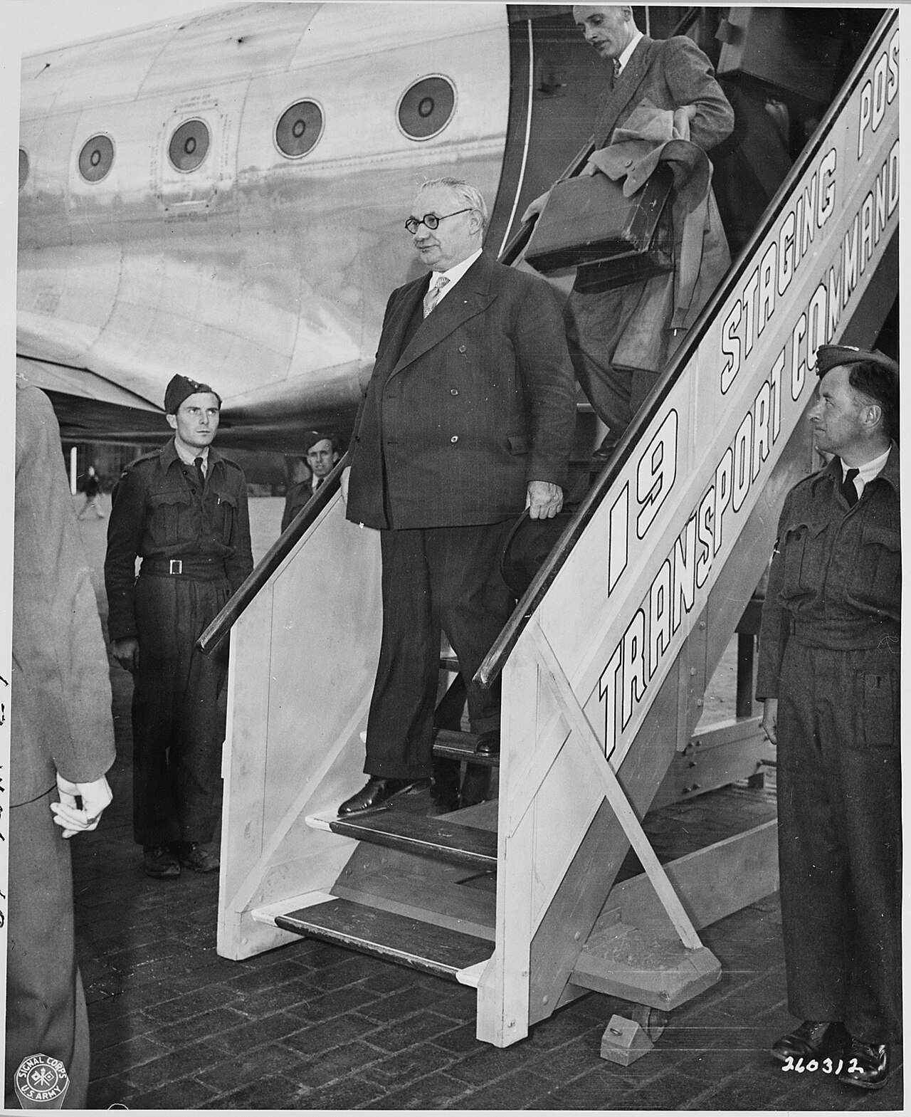 Ernest Bevin, British Minister for Foreign Affairs, arrives at Gatow Airport in Berlin, Germany to attend the Potsdam…