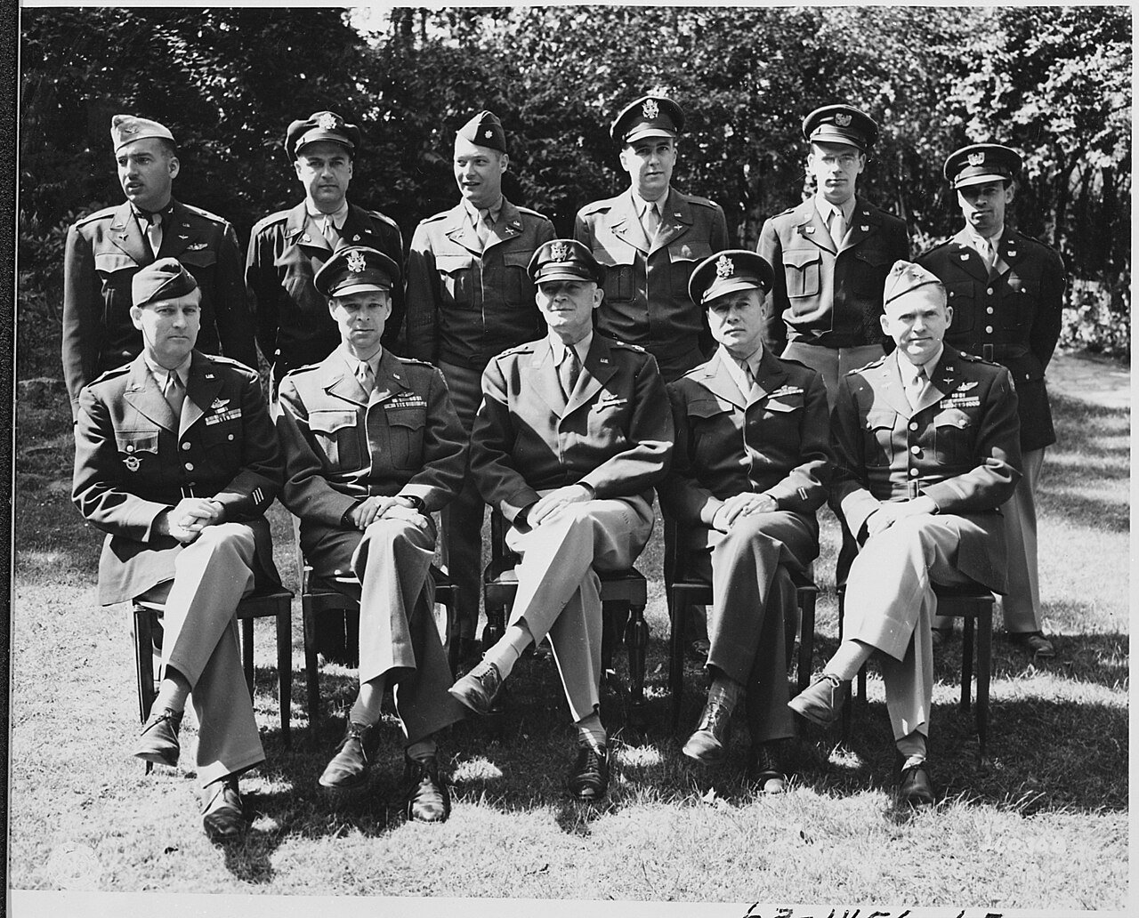 Gen. Henry "Hap" Arnold with his staff pose outdoors during the Potsdam Conference in Germany.