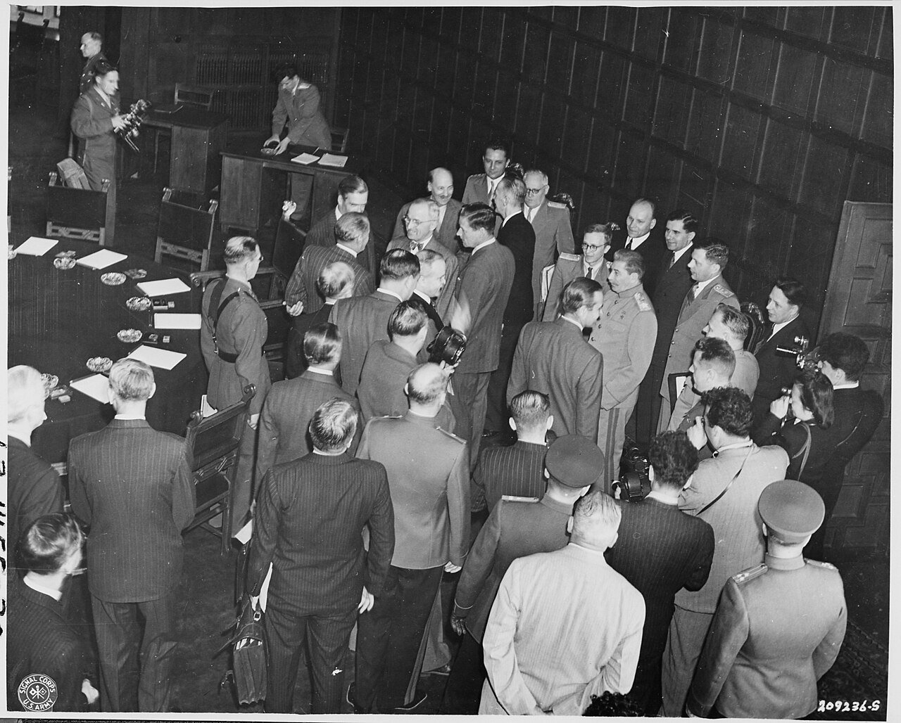 Informal conversations and introductons in the conference room prior to the opening session of the Potsdam Conference…