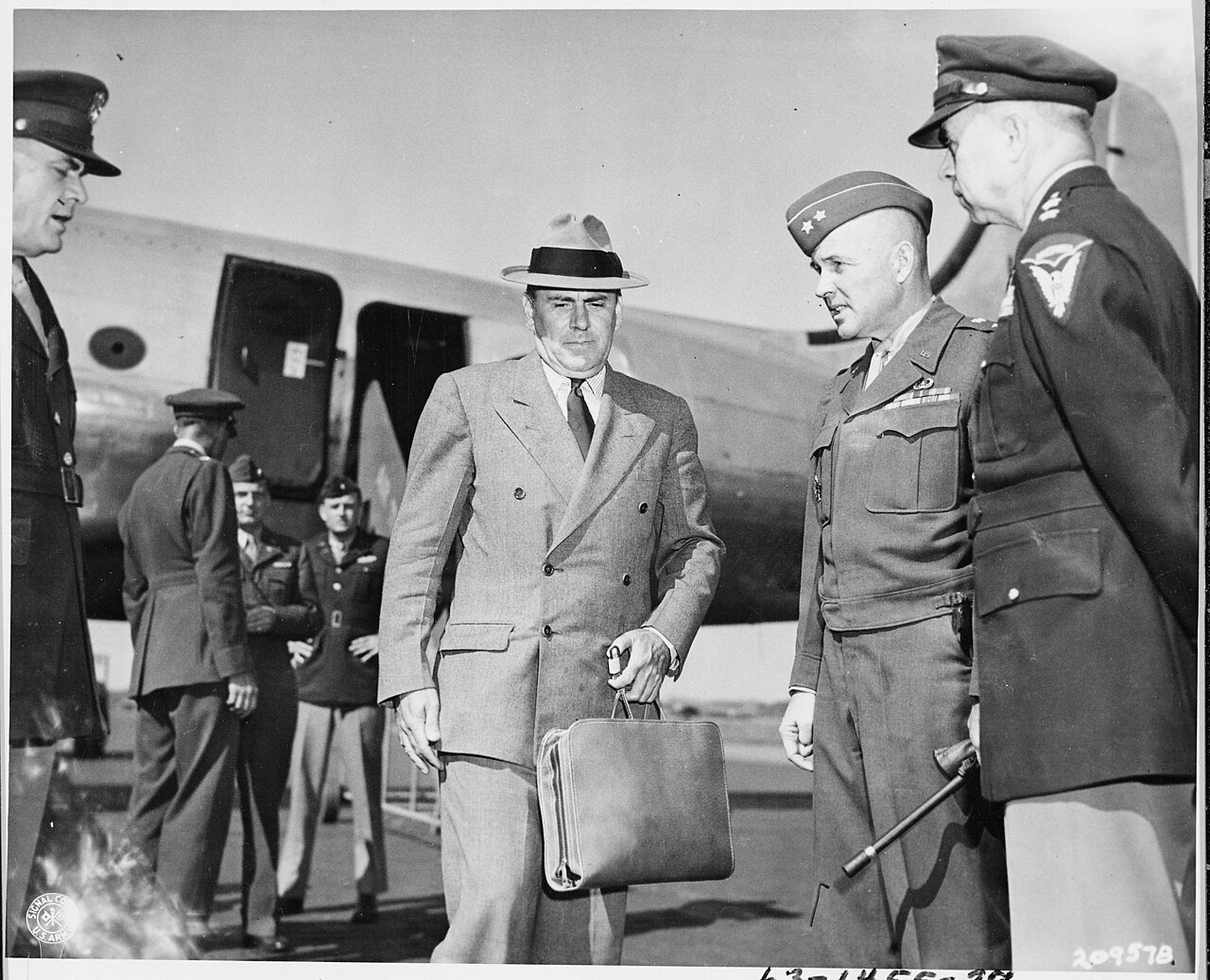 John J. McCloy, Assistant Secretary of War, arrived at Gatow Airport in Berlin, Germany to attend the Potsdam…