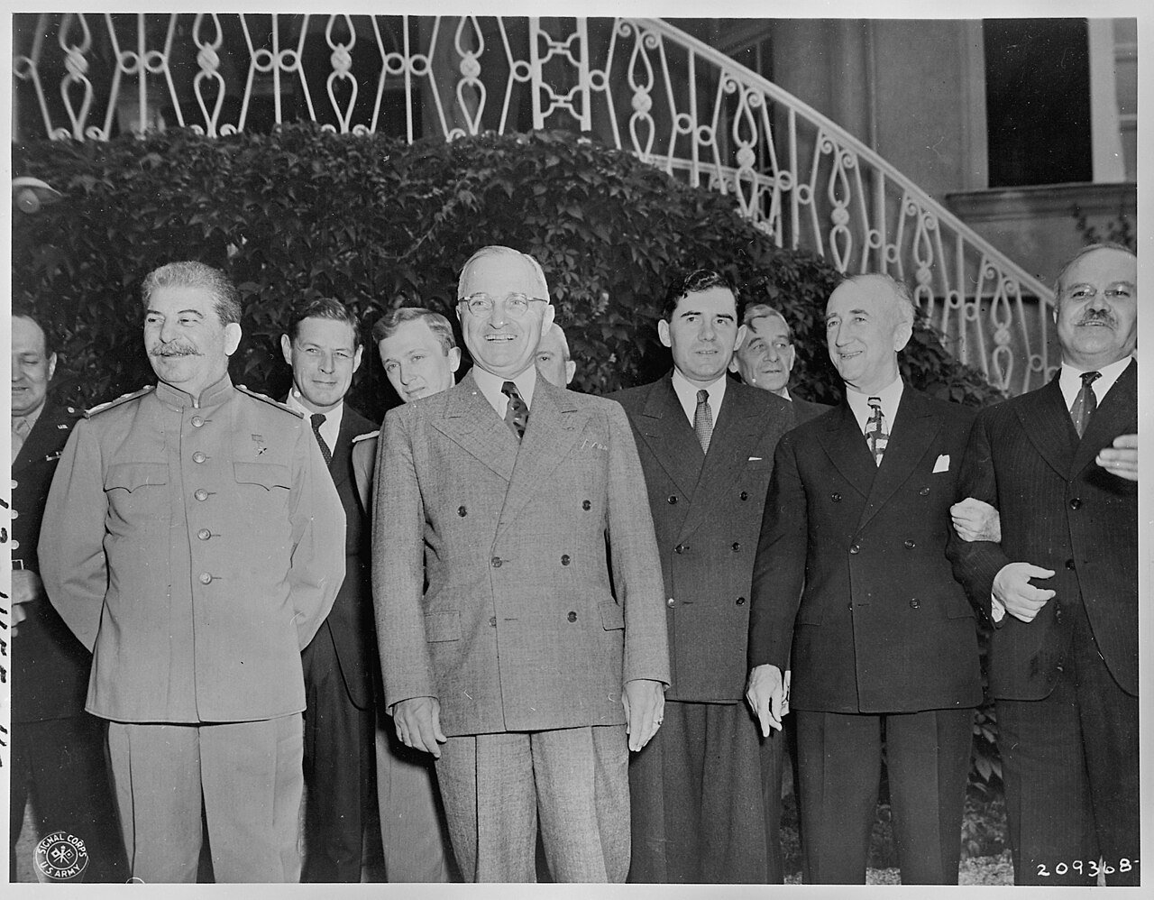 L to R, Gen. Harry Vaughan, Soviet leader Josef Stalin, Charles Bohlen, interpreter for President Truman, V. N.…