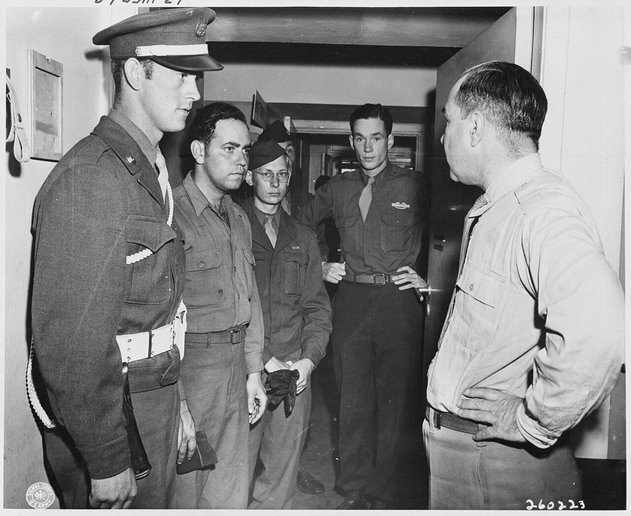 Lt. Col. James P. Smith, Jr., provost marshal of the Berlin District of Ipswich, Massachusetts, interviews applicants…