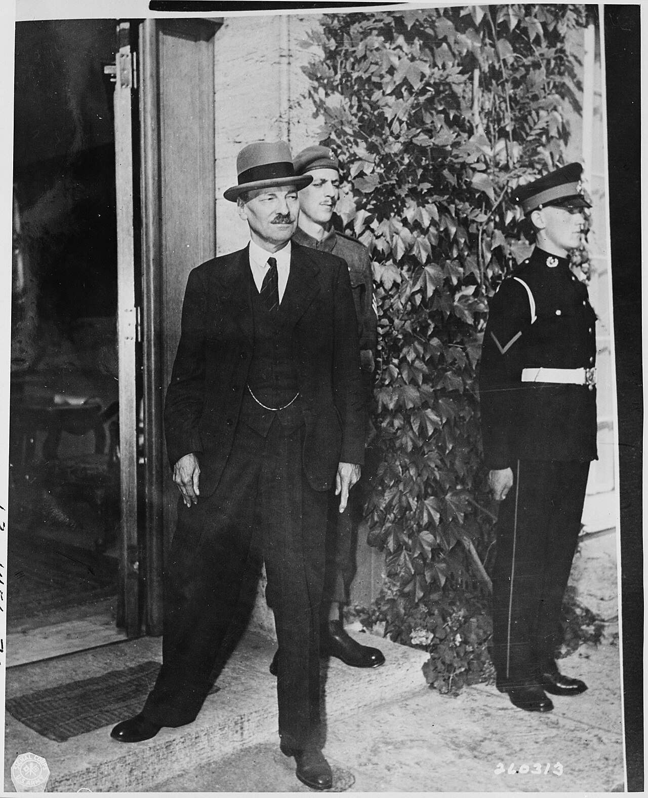 Newly appointed British Prime Minister Clement Attlee stands at the entrance to his residence shortly after his…