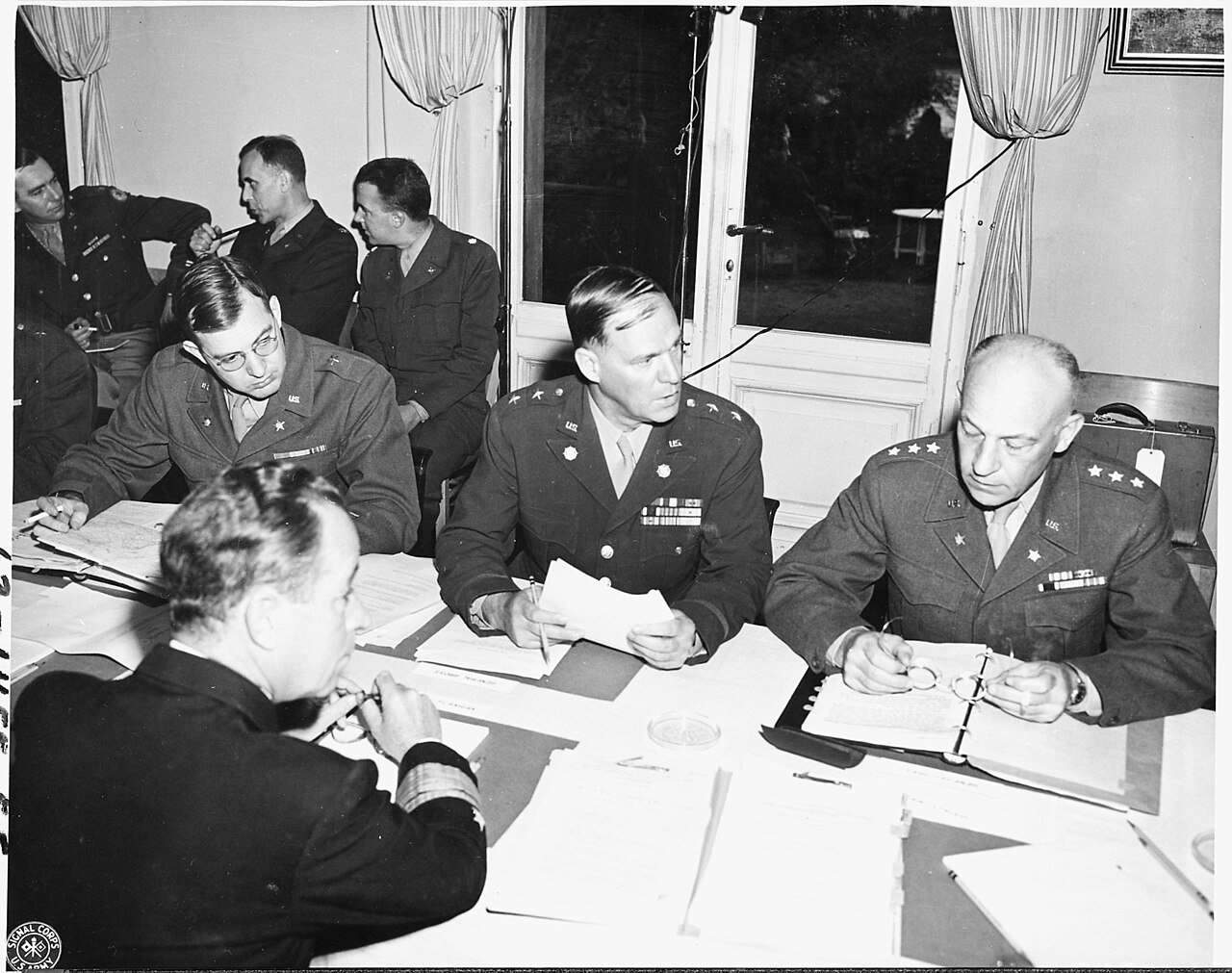 Participants in a meeting of the Joint Chiefs of Staff during the Potsdam Conference in Germany, are, L to R, Brig.…