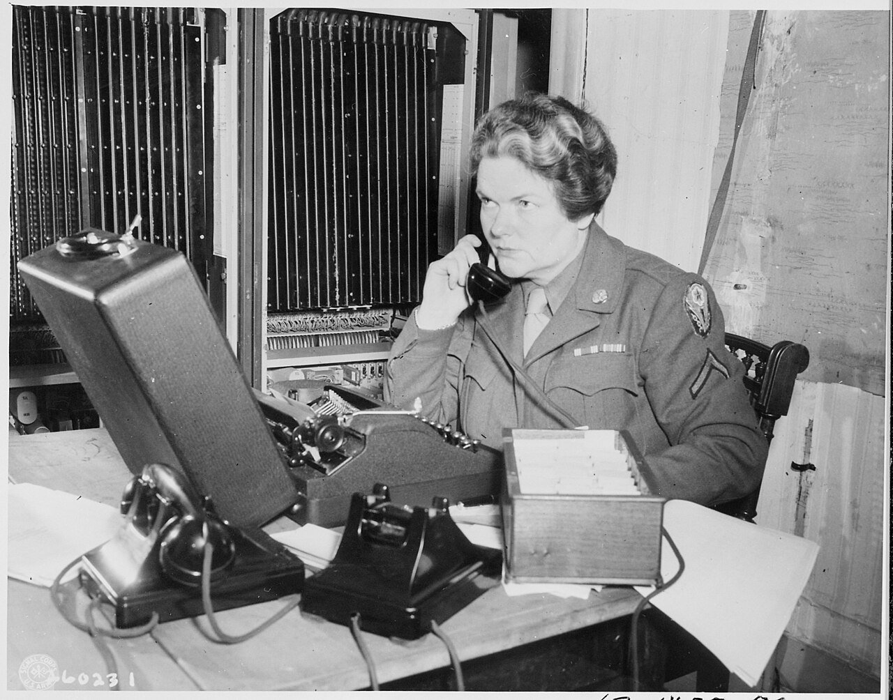 PFC Isabella Hardacre, Chicago, Illinois, a WAC telephone operator in U. S. headquarters at the Potsdam Conference in…