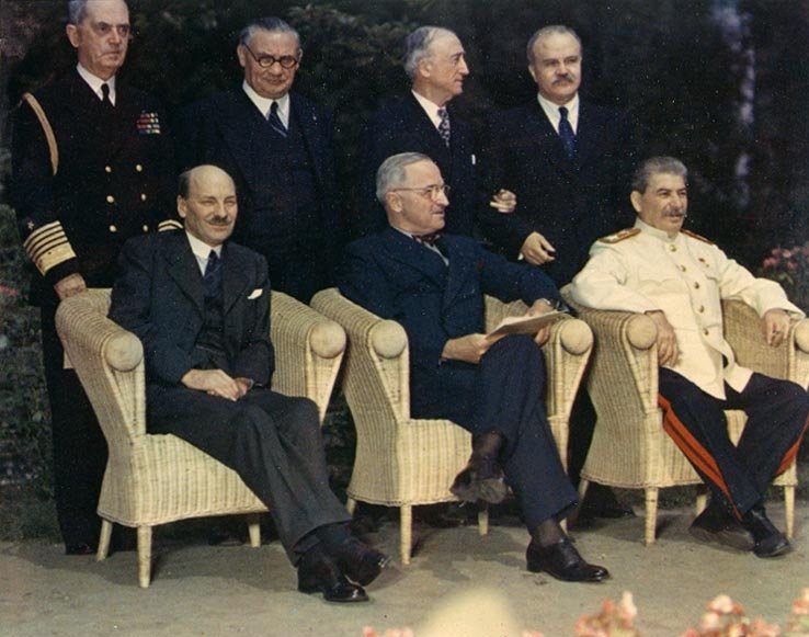 Clement Attlee, Harry S. Truman, and Joseph Stalin at the Potsdam Conference, July 1945. Photograph from the Army Signal Corps Collection in the U.S. National Archives.