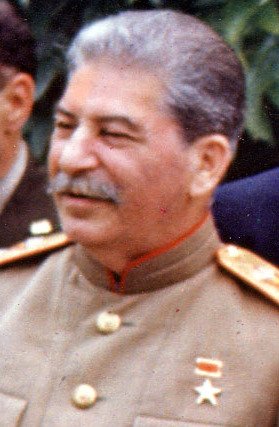 Harry S. Truman and Joseph Stalin meeting at Potsdam. From left to right, row 1 : Joseph Stalin, Harry S. Truman, Soviet Ambassador Andrei Gromyko, Secretary of State James Byrnes, and Soviet Foreign Minister Vyacheslav Molotov. Second row: General Harry Vaughan, interpreter Charles Bohlen, interpreter V. N. Pavlov (mostly obscured by Truman), Captain James K. Vardaman, and Charles Ross (partially obscured).
