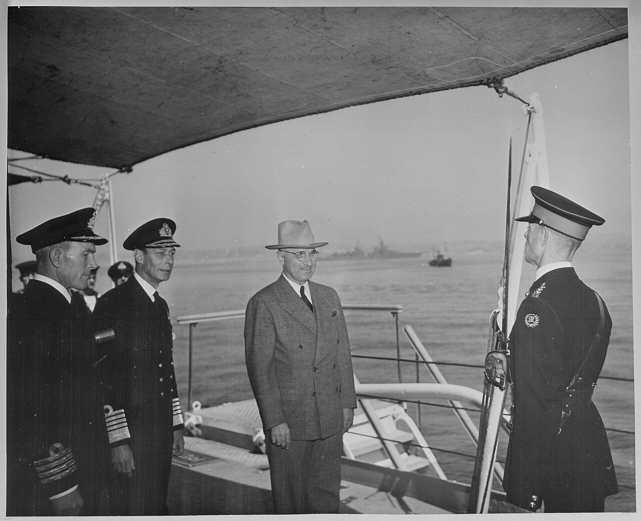 President Harry S. Truman and King George VI of England on the quarterdeck of the H. M. S. Renown where the President…
