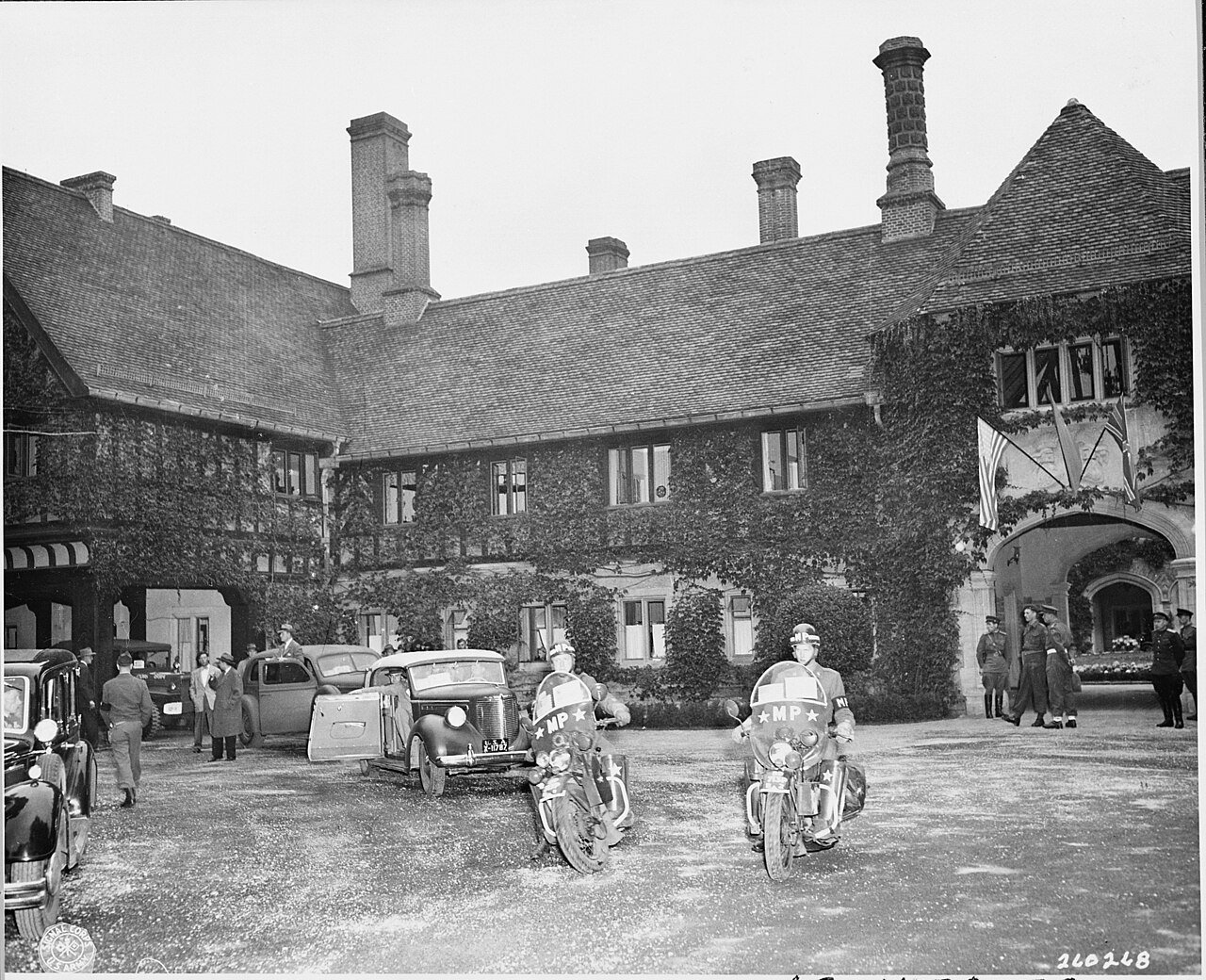 President Harry S. Truman in his car preparing to leave the Cecilienhof Palace, site of the Potsdam Conference in…