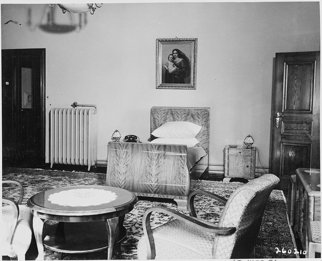President Harry S. Truman occupies this simply furnished bedroom during his attendance at the Potsdam Conference in…
