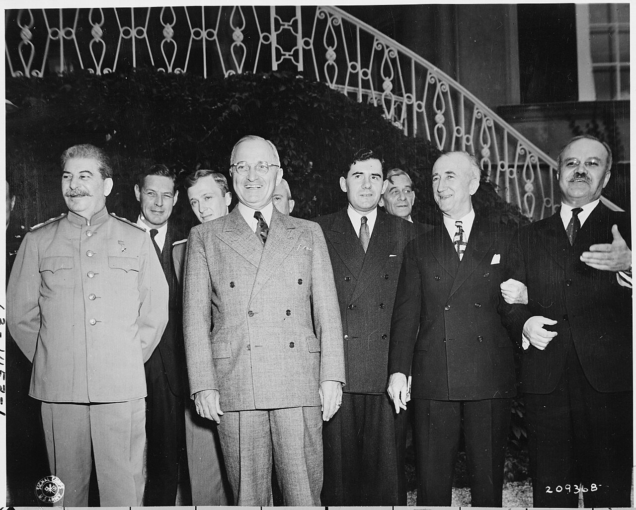 President Truman and Josef Stalin on the lawn outside of Soviet Union Prime Minister Stalin's residence during the…
