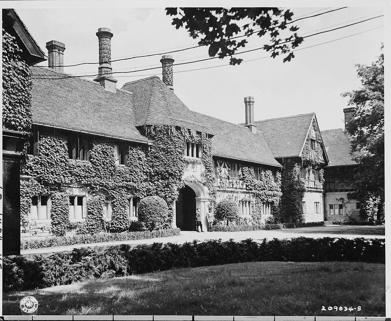 Russian soldiers stand guard at the entrance to Cecilienhof, the country house of the Crown Prince near Potsdam…