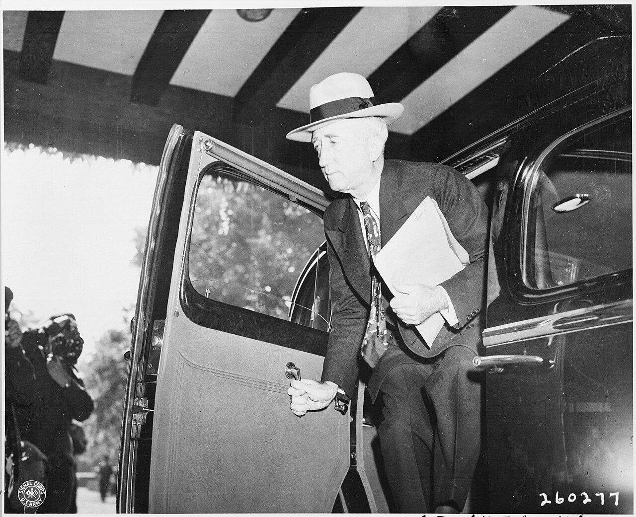Secretary of State James Byrnes leaving his car as he arrives at the Potsdam Conference in Potsdam, Germany.