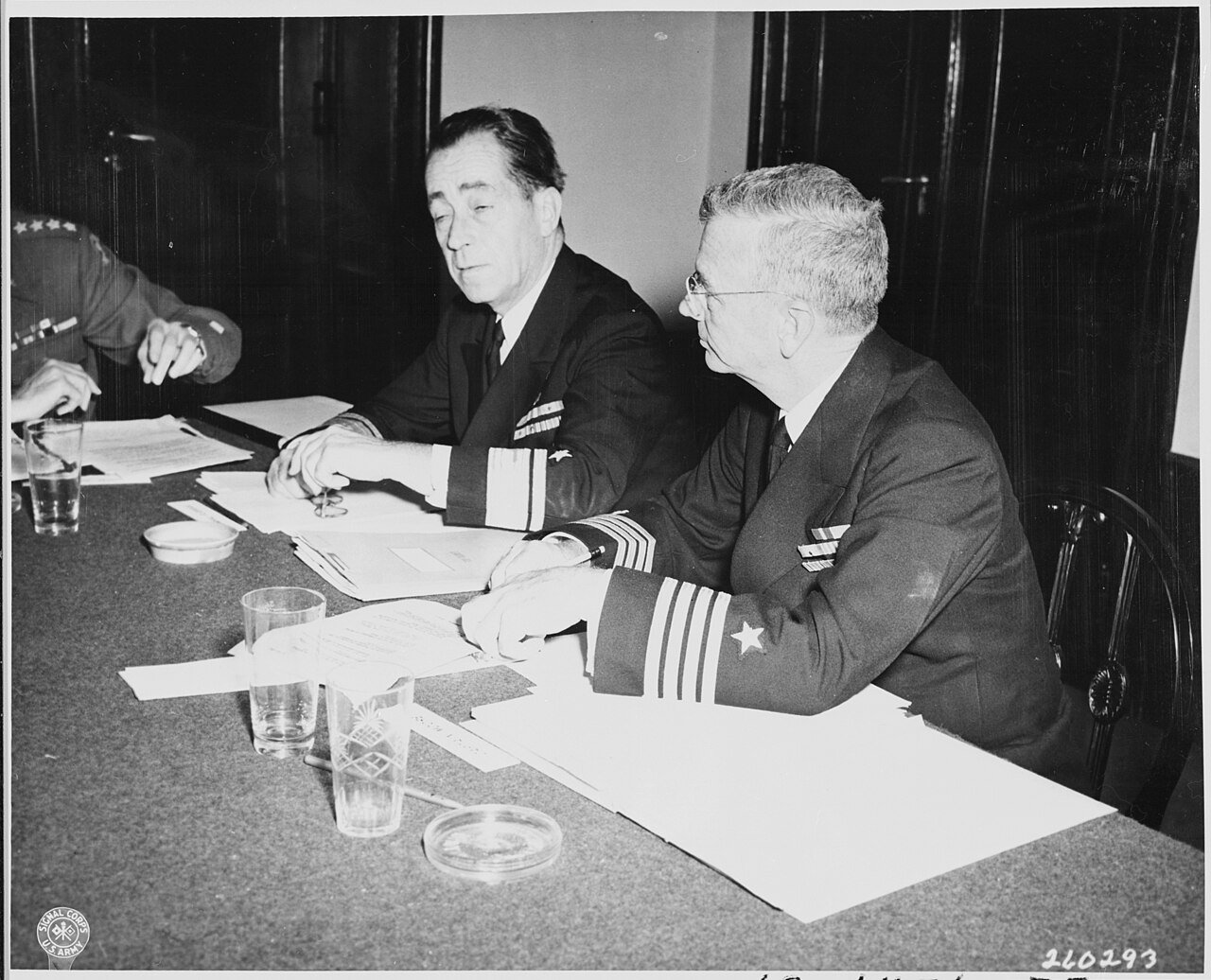 Taking part in the Combined Chiefs of Staff discussions during the Potsdam Conference in Germany, Lt to R, Rear Adm.…