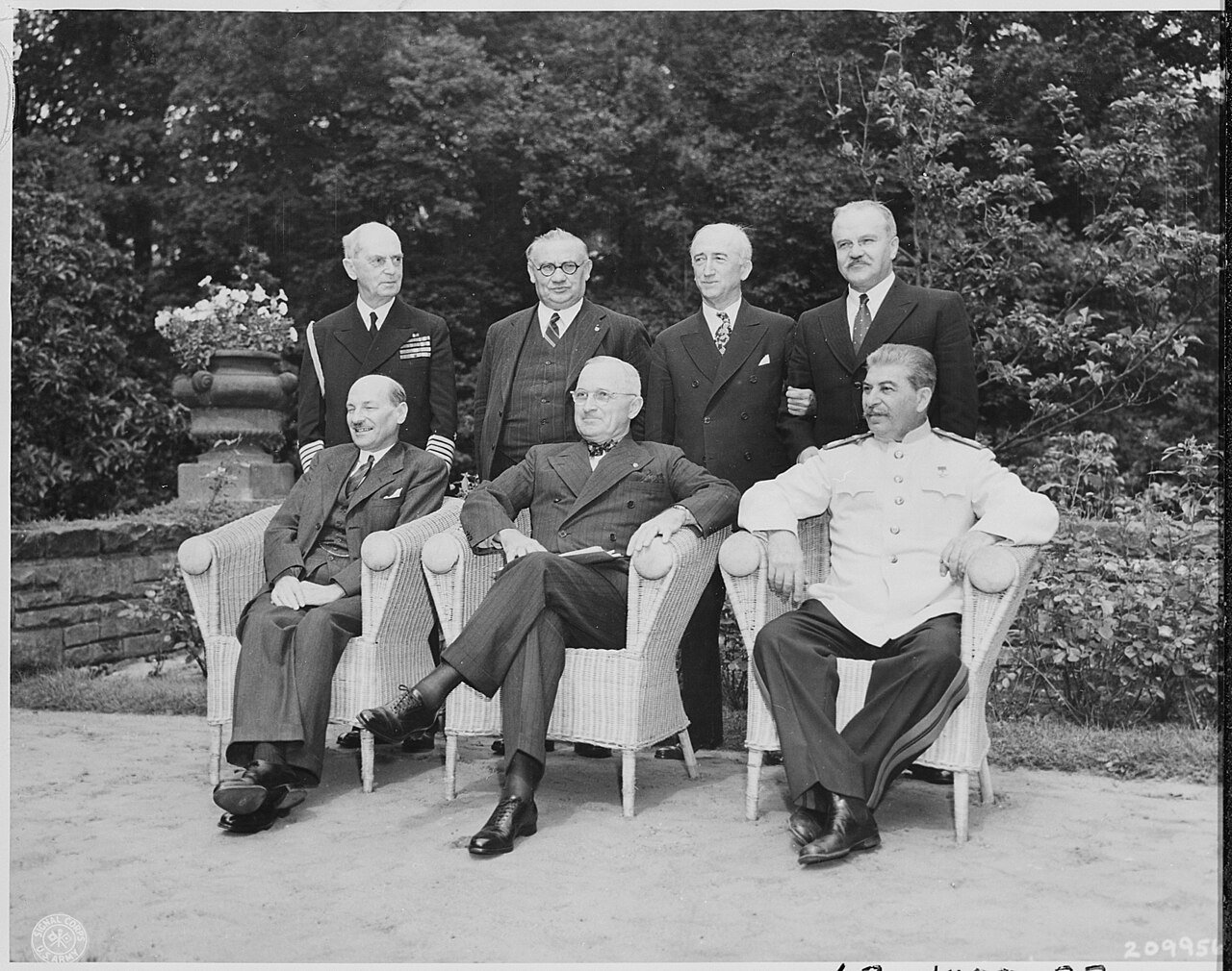 The "Big Three" and their foreign ministers gather in the garden of Cecilienhof Palace during the last day of the…