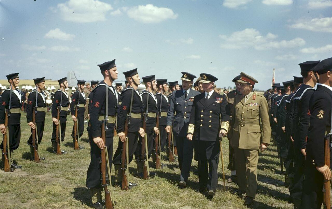 The Potsdam Conference, July 1945 The Chiefs of Staff, Air Marshal Sir Charles Portal, Admiral Sir Andrew Cunningham and Field Marshal Sir Alan Brooke inspect a Naval Guard of Honour at the airport in Berlin before the start of the conference.