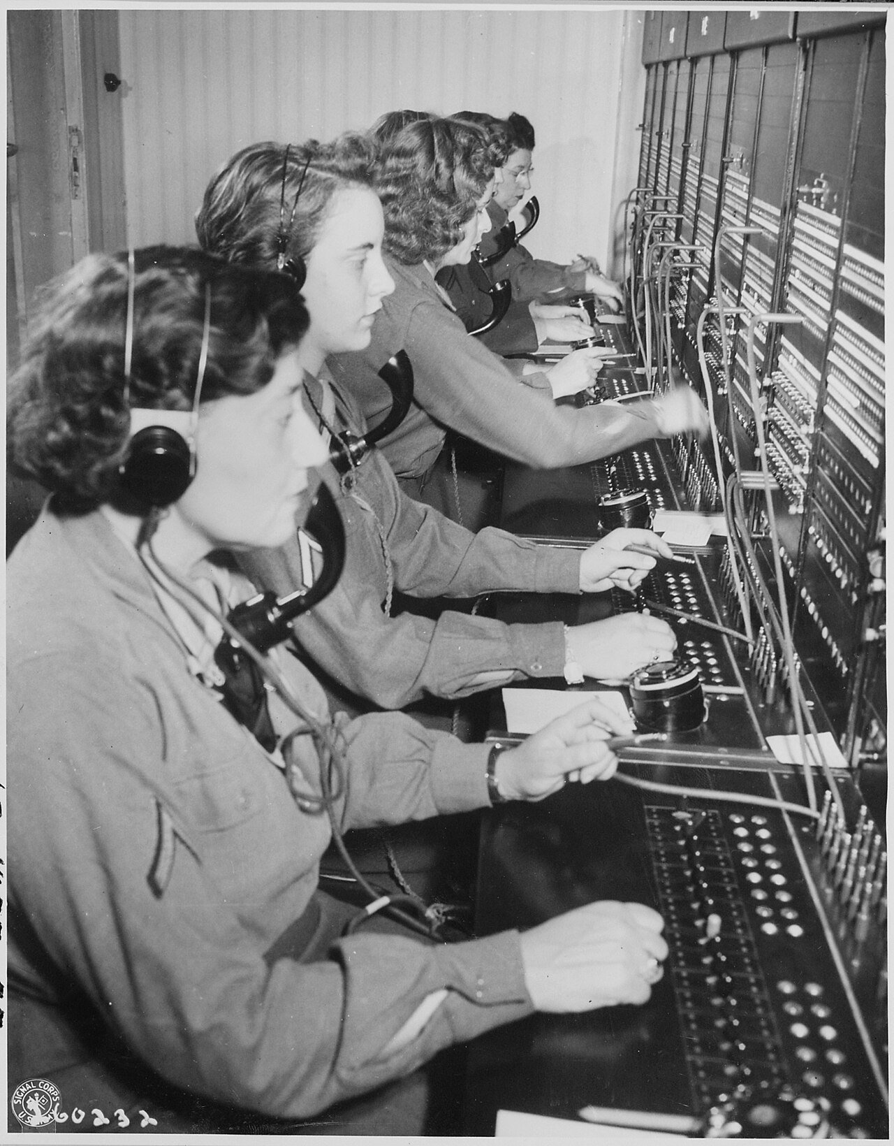 WAC telephone operators operate the Victory switchboard during the Potsdam Conference in their headquarters in…