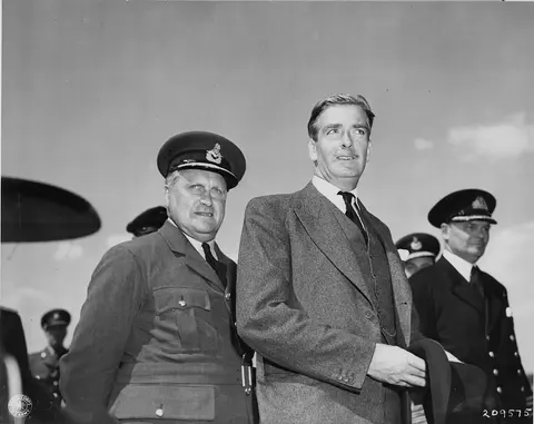 Anthony Eden (foreground, right) arrives at Gatow Airport in Berlin for the Potsdam Conference. Others are unidentified. From Potsdam album, 1945.