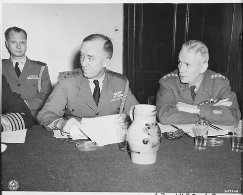 Chiefs of Staff, L to R, Vice Adm. C. M. Cooke, Jr. and Gen. Brehon B. Somervell at a meeting during the Potsdam…