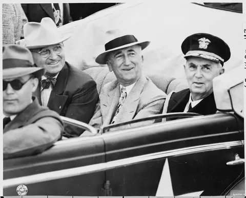 Closeup, L to R, in car, President Harry S. Truman, Secretary of State James Byrnes, and Fleet Admiral William Leahy…
