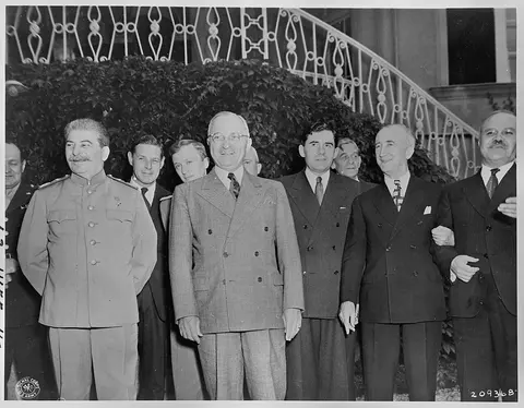 L to R, Gen. Harry Vaughan, Soviet leader Josef Stalin, Charles Bohlen, interpreter for President Truman, V. N.…