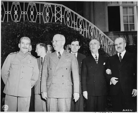 President Harry S. Truman visits Soviet Prime Minister Josef Stalin at Mr. Stalin's residence during the Potsdam…
