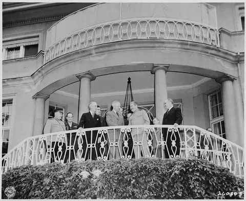 President Harry S. Truman with Secretary of State James Byrnes, visits Premier Josef Stalin of the Soviet Union at…