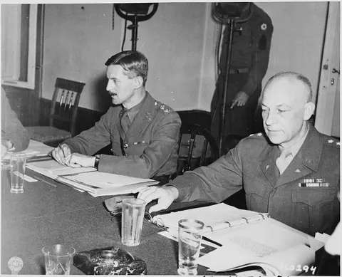 Taking part in the Combined Chiefs of Staff discussion during the Potsdam Conference in Germany, L to R, Col. Thomas…